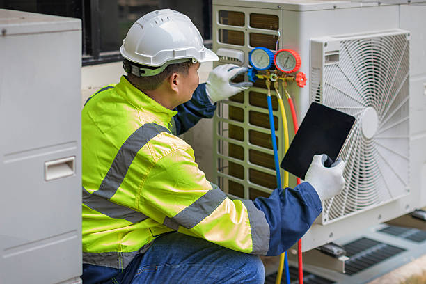 Professional Heat Pump Repair technician working in Smithville, NJ